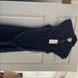 Brand new navy dress with details on fabric